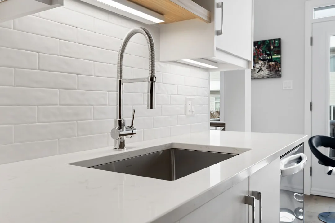 Modern kitchen with sink and plumbing
