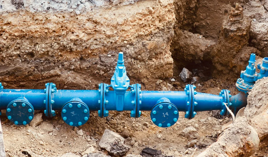 Blue water pipe installation close up during works